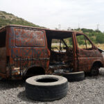 An abandoned burnt out car