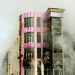 shopping center or mall fire,smoke,fighters,space for copy or te